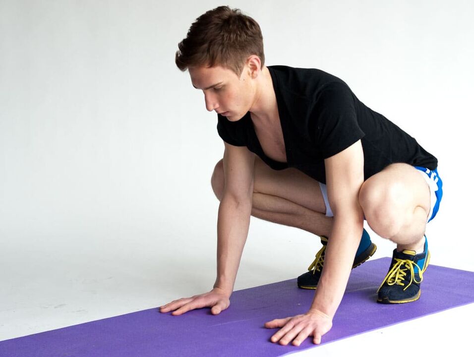 Exercise Frog for working the muscles of the pelvic region of a man